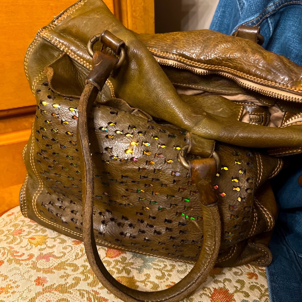 Campomaggi bag perforated fish pocket.